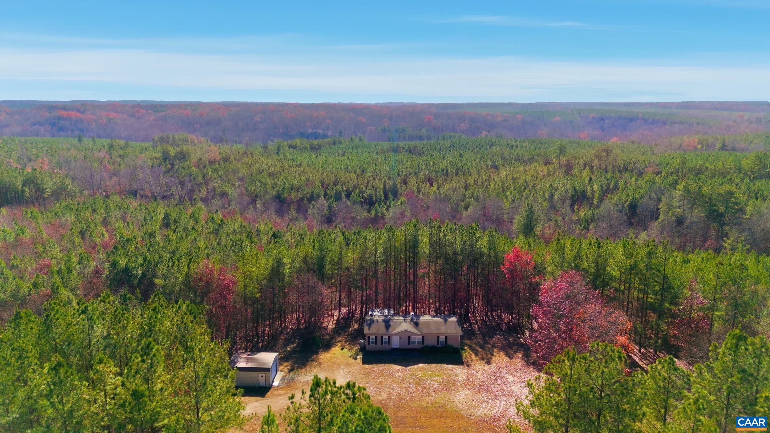 1690 Poorhouse Creek Road Appomattox, VA 24522 - Photo 42 of 44 a view of a city with lush green forest