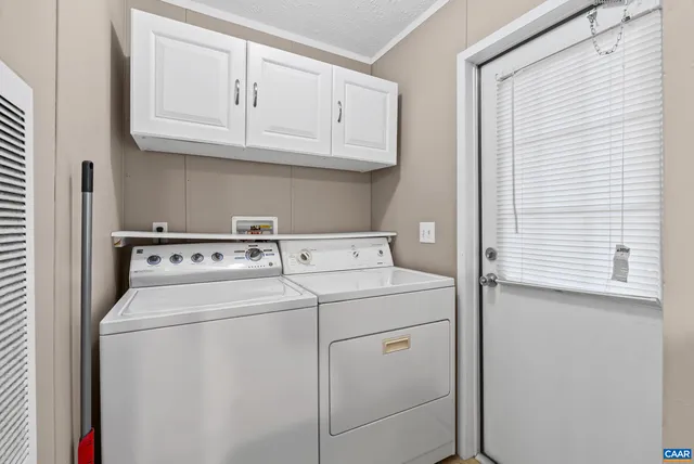 a kitchen with stainless steel appliances granite countertop a refrigerator stove microwave and sink