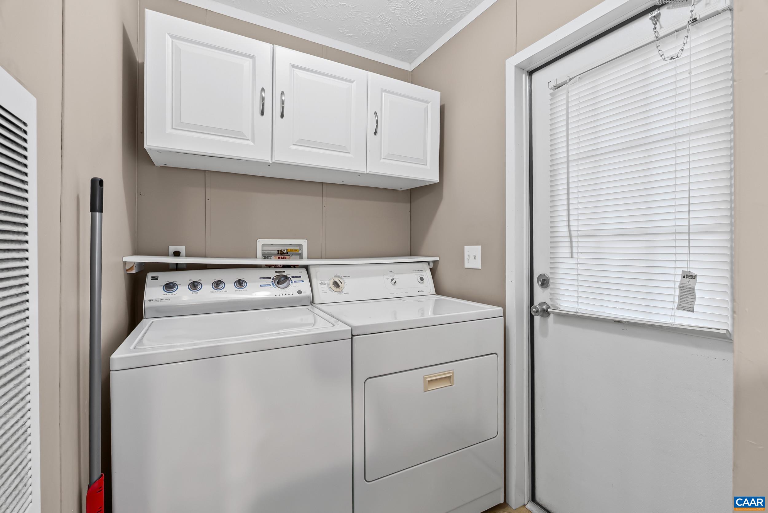 1690 Poorhouse Creek Road Appomattox, VA 24522 - Photo 9 of 44 a utility room with dryer and washer