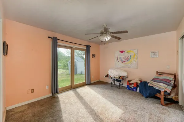 a room with furniture and a window