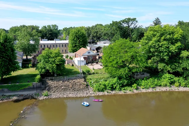 a view of a garden with a lake view