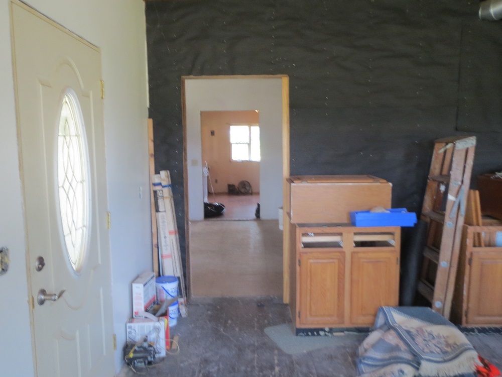 21785 Brooks Road Prophetstown, IL 61277 - Photo 17 of 38 a kitchen with a refrigerator and a wooden floor