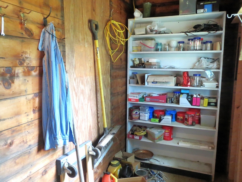 21785 Brooks Road Prophetstown, IL 61277 - Photo 30 of 38 a shelf with books and knick knacks on it