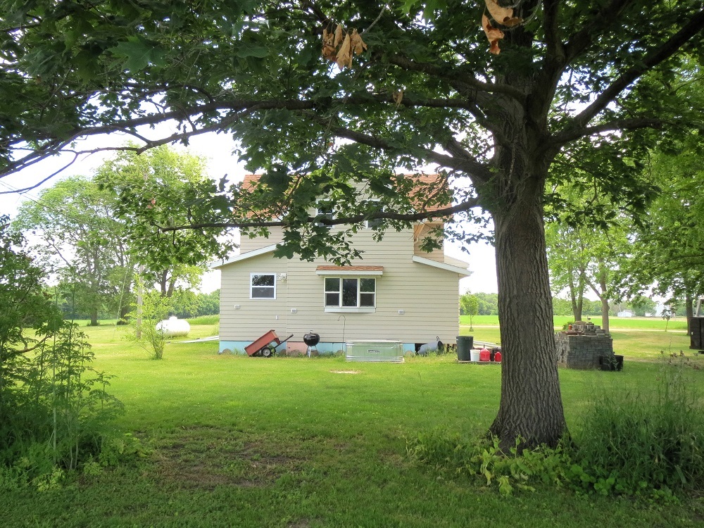 21785 Brooks Road Prophetstown, IL 61277 - Photo 33 of 38 a front view of house with yard and green space