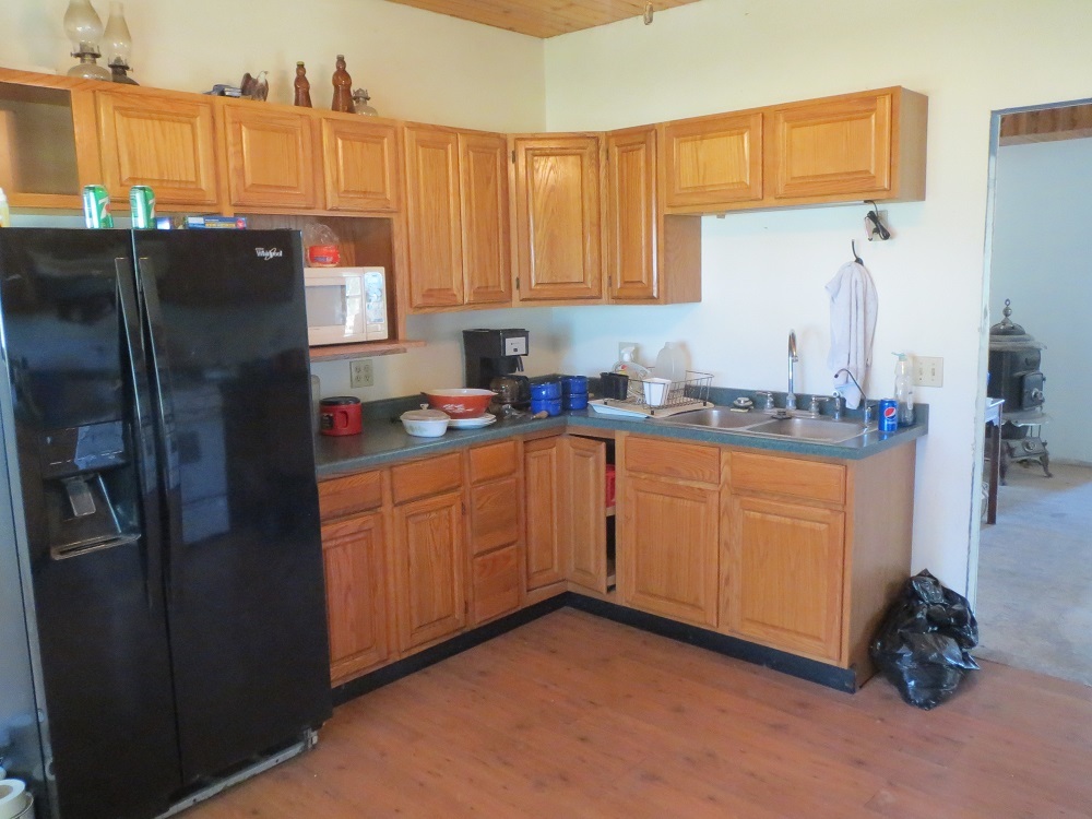 21785 Brooks Road Prophetstown, IL 61277 - Photo 6 of 38 a kitchen with stainless steel appliances granite countertop a refrigerator and a sink