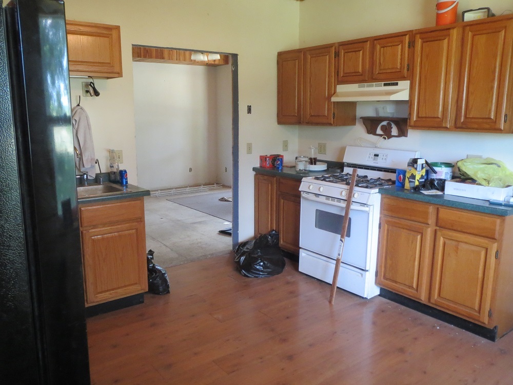 21785 Brooks Road Prophetstown, IL 61277 - Photo 7 of 38 a kitchen with cabinets and appliances