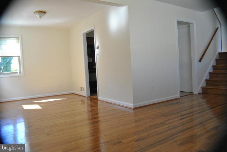 6815 Cabin John Road Springfield, VA 22150 - Photo 7 of 18 Living Room/Dining Room