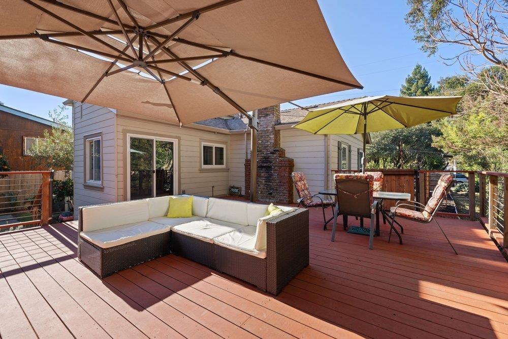 9600 Golf Links Road Oakland, CA 94605 - Photo 2 of 47 Wooden deck with outdoor dining space and outdoor lounge area