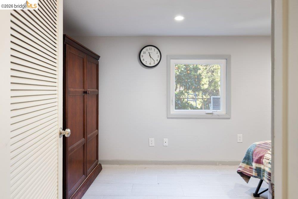 9600 Golf Links Road Oakland, CA 94605 - Photo 29 of 47 Bonus room with tile flooring and recessed lighting