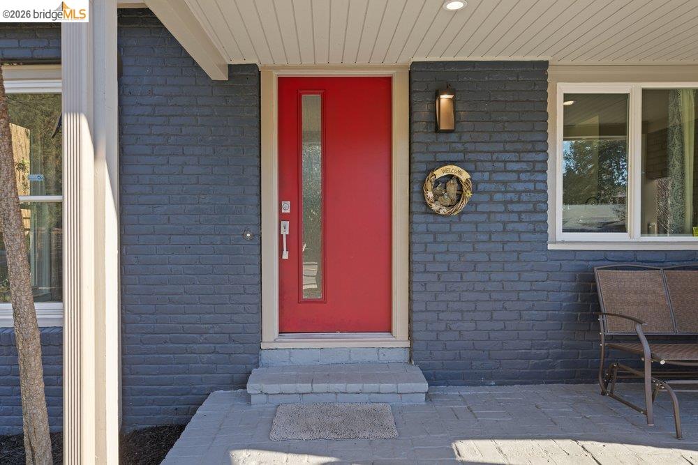 9600 Golf Links Road Oakland, CA 94605 - Photo 7 of 47 Doorway to property with brick siding