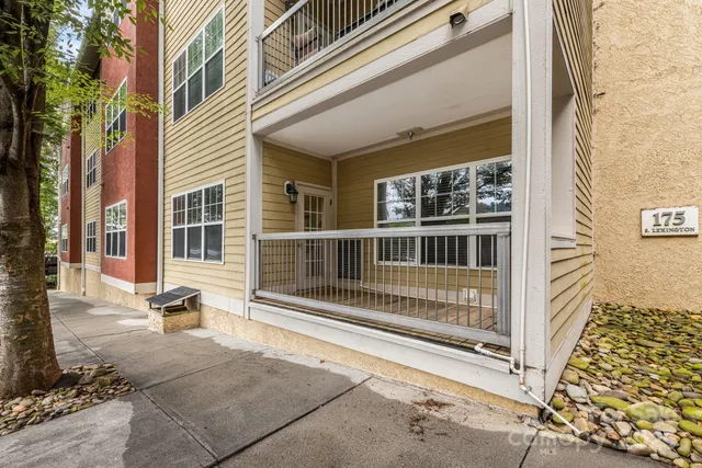 a view of a house with a large window