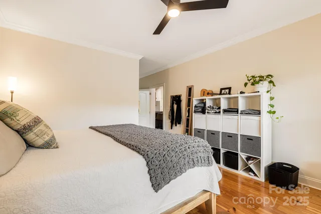 a bedroom with a bed and dresser