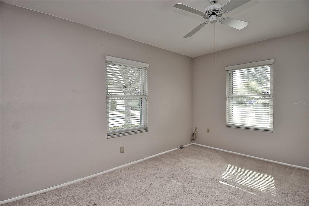 4058 Center Pointe Place, Unit 28A Sarasota, FL 34233 - Photo 16 of 24 a view of an empty room with a window