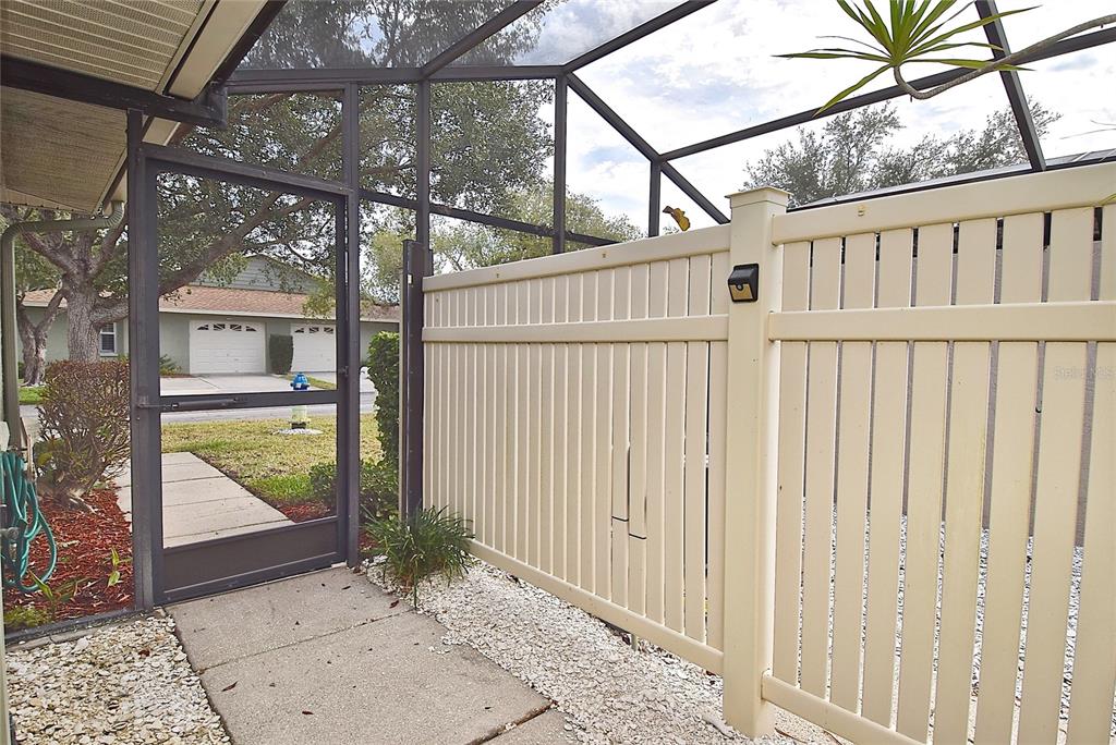 4058 Center Pointe Place, Unit 28A Sarasota, FL 34233 - Photo 20 of 24 a view of a entrance gate of the house