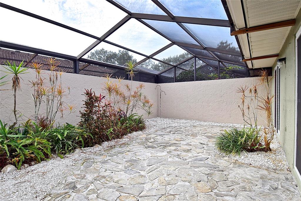 4058 Center Pointe Place, Unit 28A Sarasota, FL 34233 - Photo 21 of 24 a view of a pathway