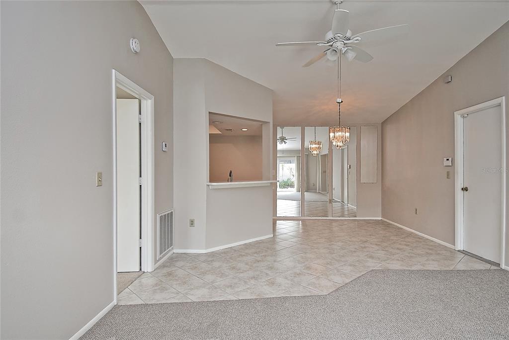 4058 Center Pointe Place, Unit 28A Sarasota, FL 34233 - Photo 4 of 24 a view of an empty room with a window