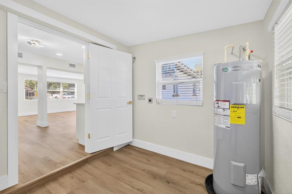 928 Valmar Street Brandon, FL 33511 - Photo 21 of 35 a view of an entryway with wooden floor