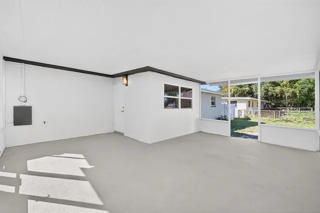 an empty room with windows