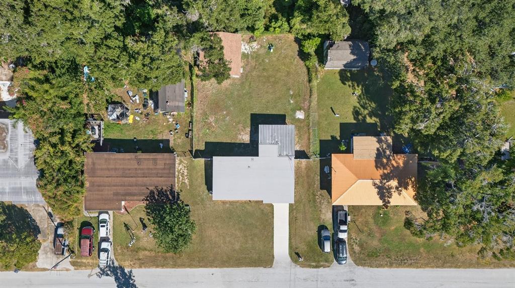 928 Valmar Street Brandon, FL 33511 - Photo 34 of 35 an aerial view of residential houses with outdoor space