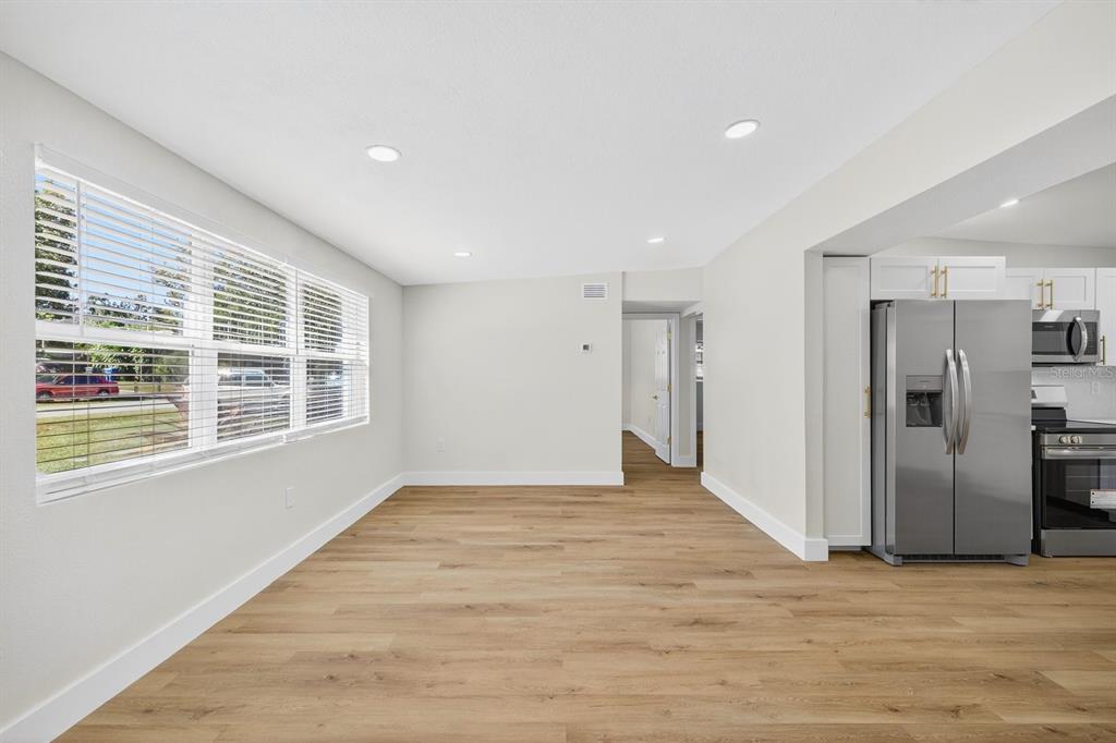 928 Valmar Street Brandon, FL 33511 - Photo 6 of 35 a view of an empty room with a window