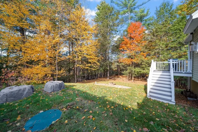 a backyard of a house with lots of green space