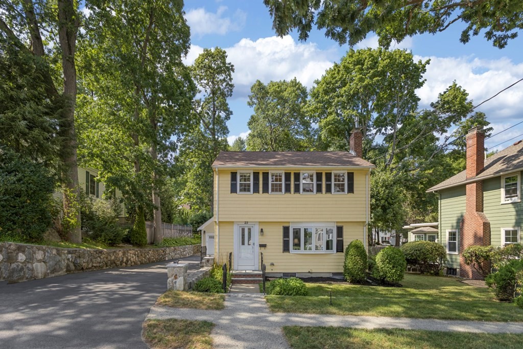25 Oak Street Reading, MA 01867 - Photo 2 of 42 a view of a house with yard and plants