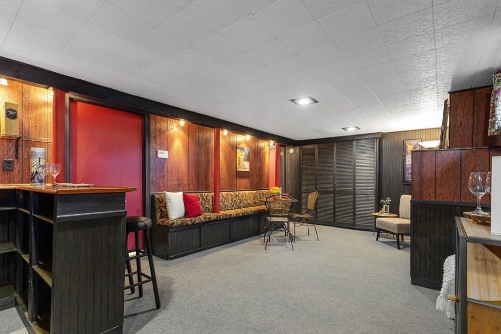 25 Oak Street Reading, MA 01867 - Photo 31 of 42 a living room with furniture and large windows