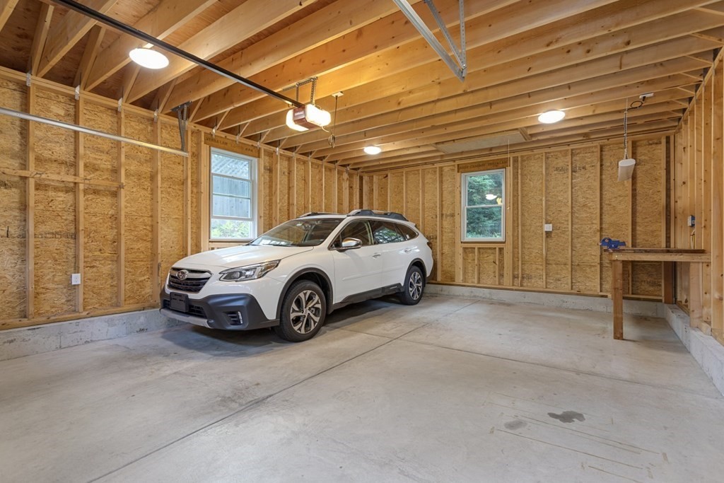 25 Oak Street Reading, MA 01867 - Photo 36 of 42 a view of a car in garage