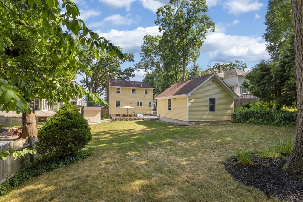 25 Oak Street Reading, MA 01867 - Photo 40 of 42 a view of a house with backyard and garden
