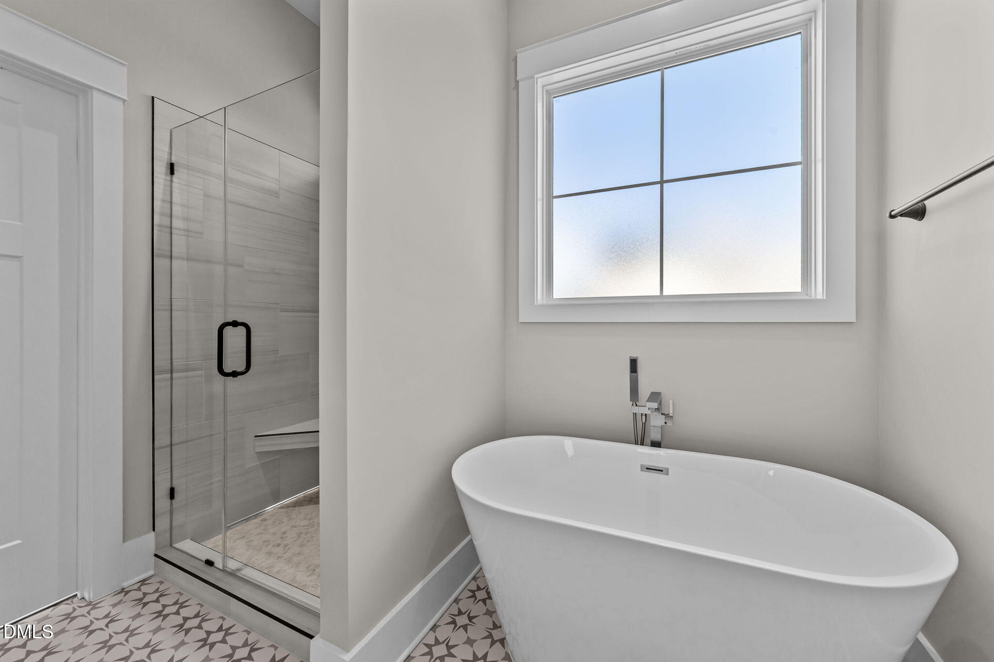 2568 Lassiter Road Four Oaks, NC 27524 - Photo 23 of 50 a white bath tub sitting next to a shower