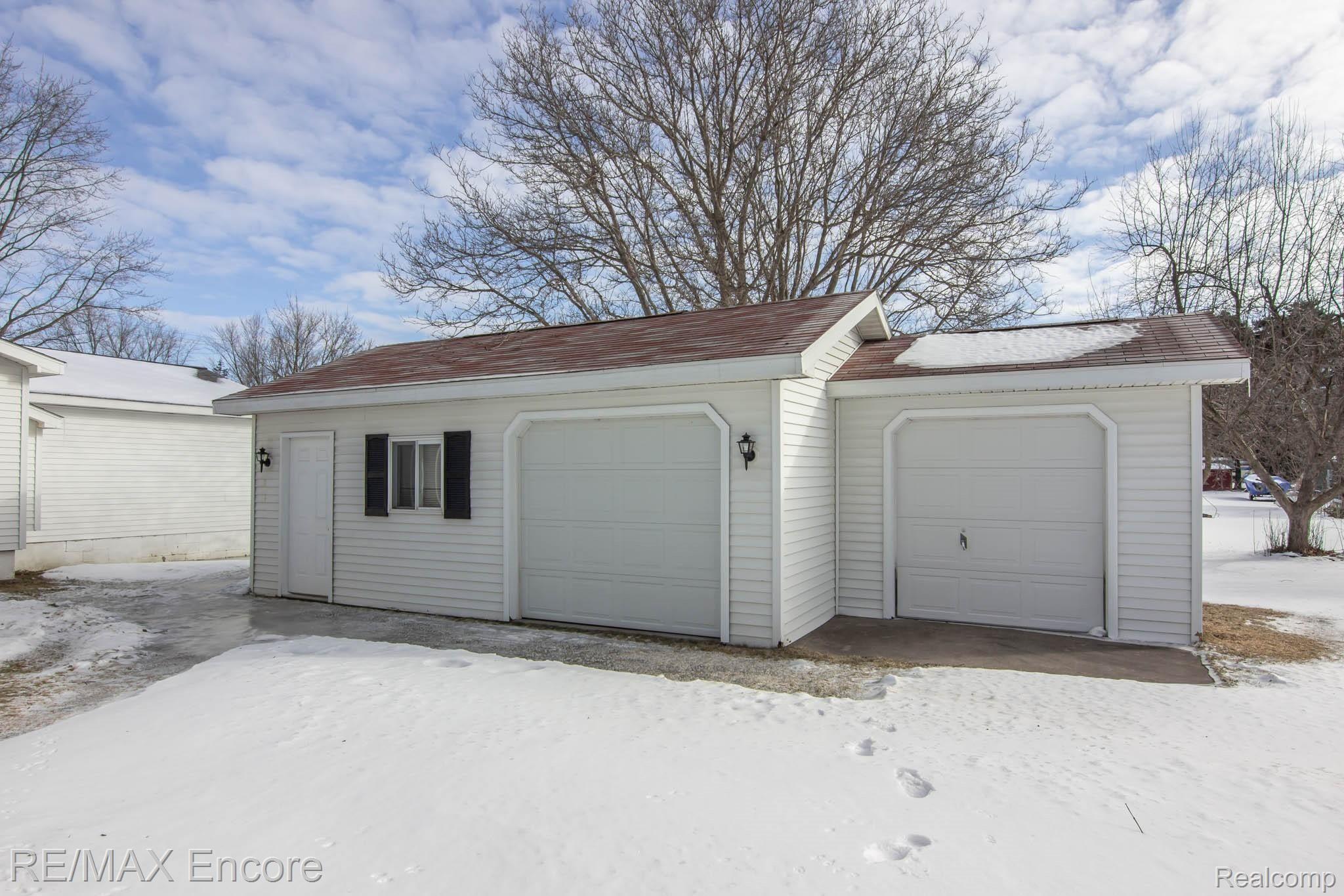 9422 Green Road Goodrich, MI 48438 - Photo 38 of 44 Heated Pole Barn with Attached Shed