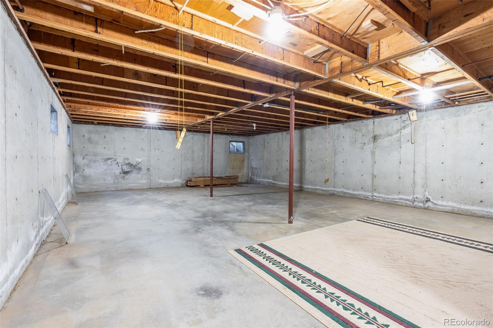 7572 Surrey Drive Morrison, CO 80465 - Photo 22 of 38 a view of a room with gym equipment
