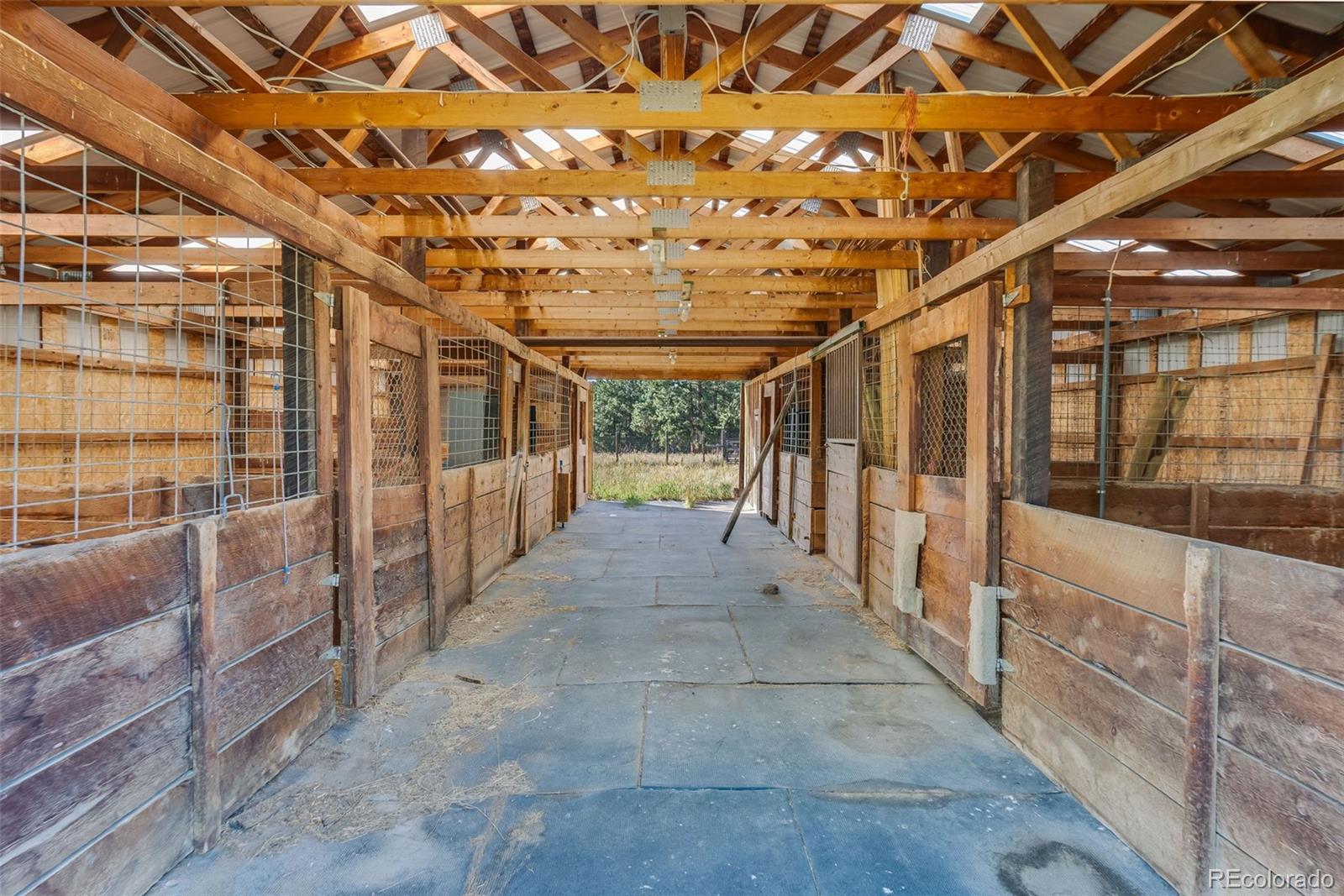 7572 Surrey Drive Morrison, CO 80465 - Photo 26 of 38 a view of a porch with a patio