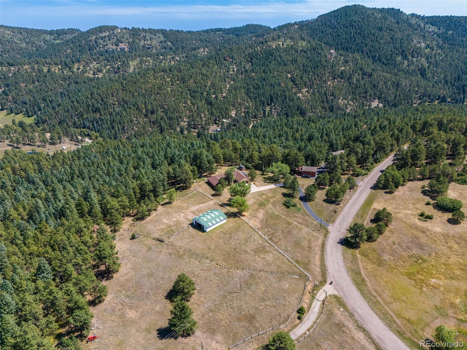 7572 Surrey Drive Morrison, CO 80465 - Photo 35 of 38 an aerial view of a house with outdoor space