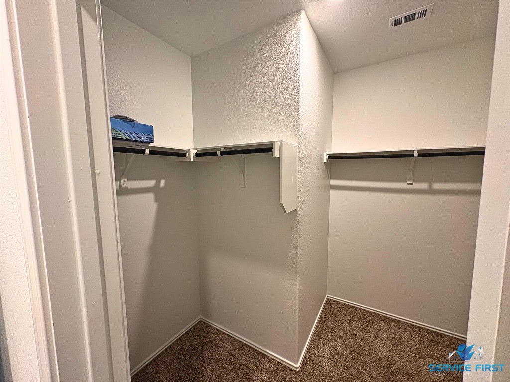 124 Rooster Way Jarrell, TX 76537 - Photo 12 of 27 a view of closet