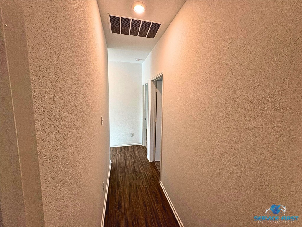 124 Rooster Way Jarrell, TX 76537 - Photo 25 of 27 a view of a hallway