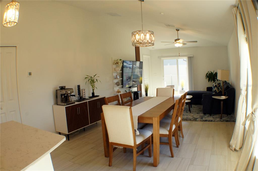1714 Lanier Road Zephyrhills, FL 33541 - Photo 5 of 23 a view of a dining room with furniture