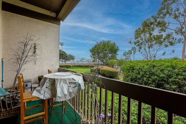 a view of balcony with furniture