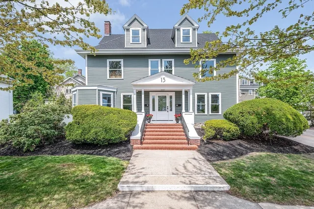 a view of a front of house with a street