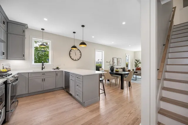 a kitchen with sink and cabinets