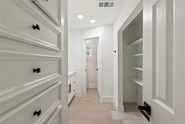 a view of an entryway with hallway