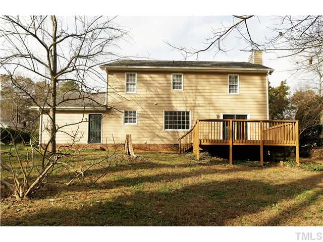 6534 Glendower Road Raleigh, NC 27613 - Photo 2 of 3 a view of a house with a large window and wooden fence