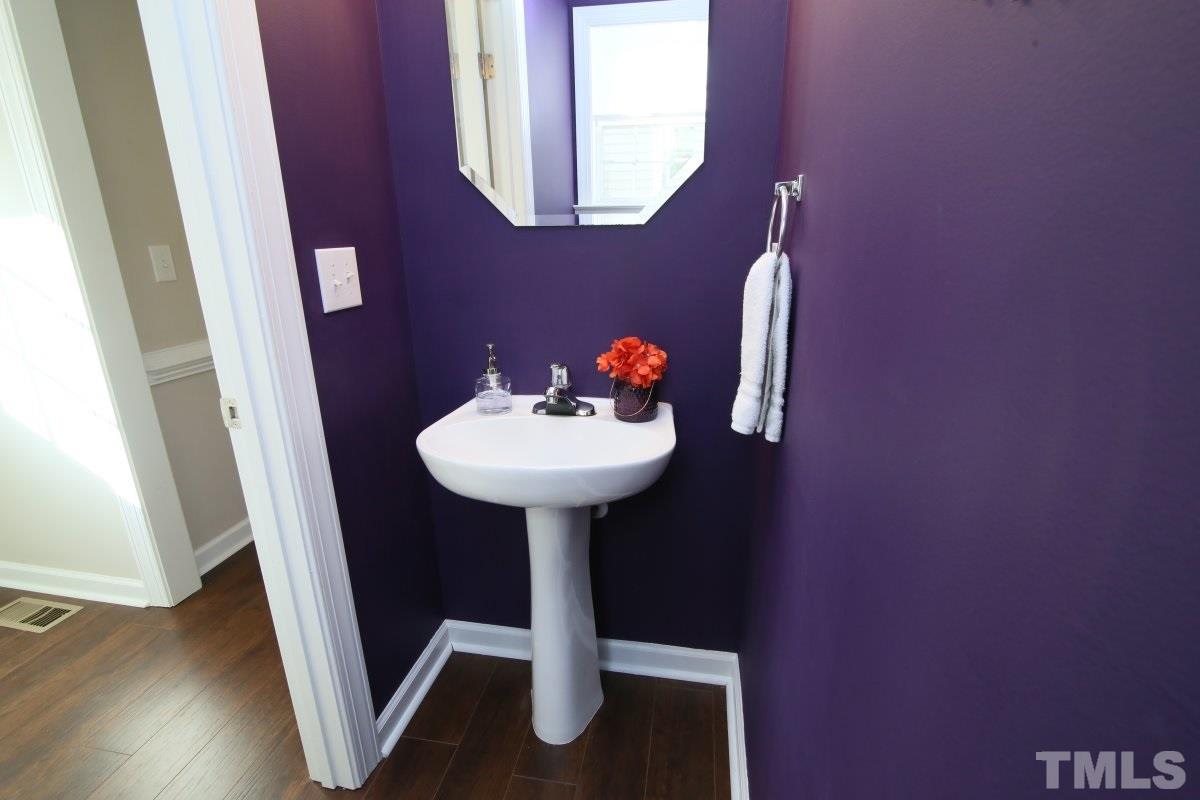 9212 Pennythorne Court Raleigh, NC 27615 - Photo 17 of 25 a front view of a house with a sink