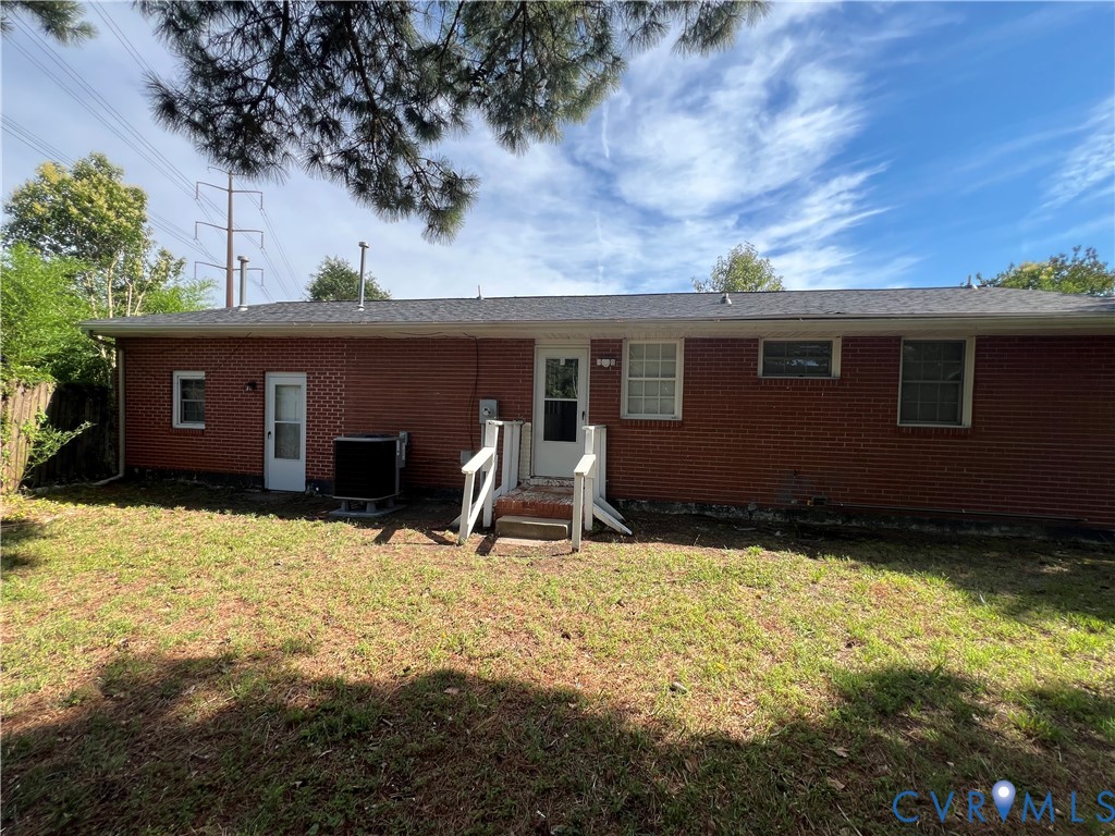 1403 Algona Road Chesapeake, VA 23324 - Photo 35 of 39 Red brick exterior featuring a white door, white w