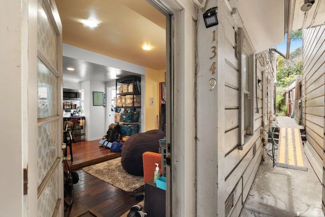 a view of living room and kitchen