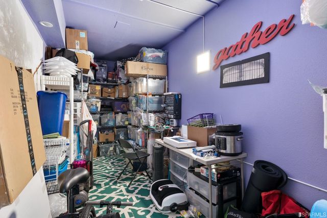 a backyard of a house with outdoor seating