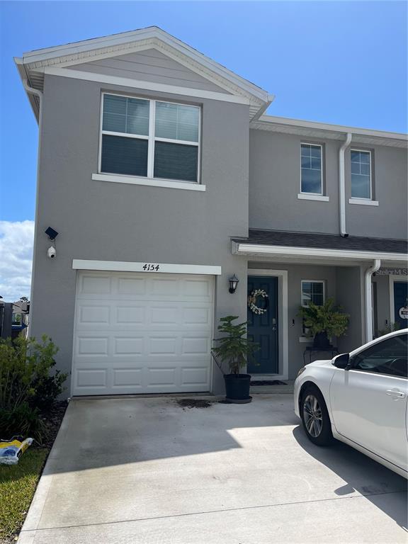 4154 Malawi Trail, Unit 2 St. Cloud, FL 34772 - Photo 1 of 1 a view of car parked in front of house