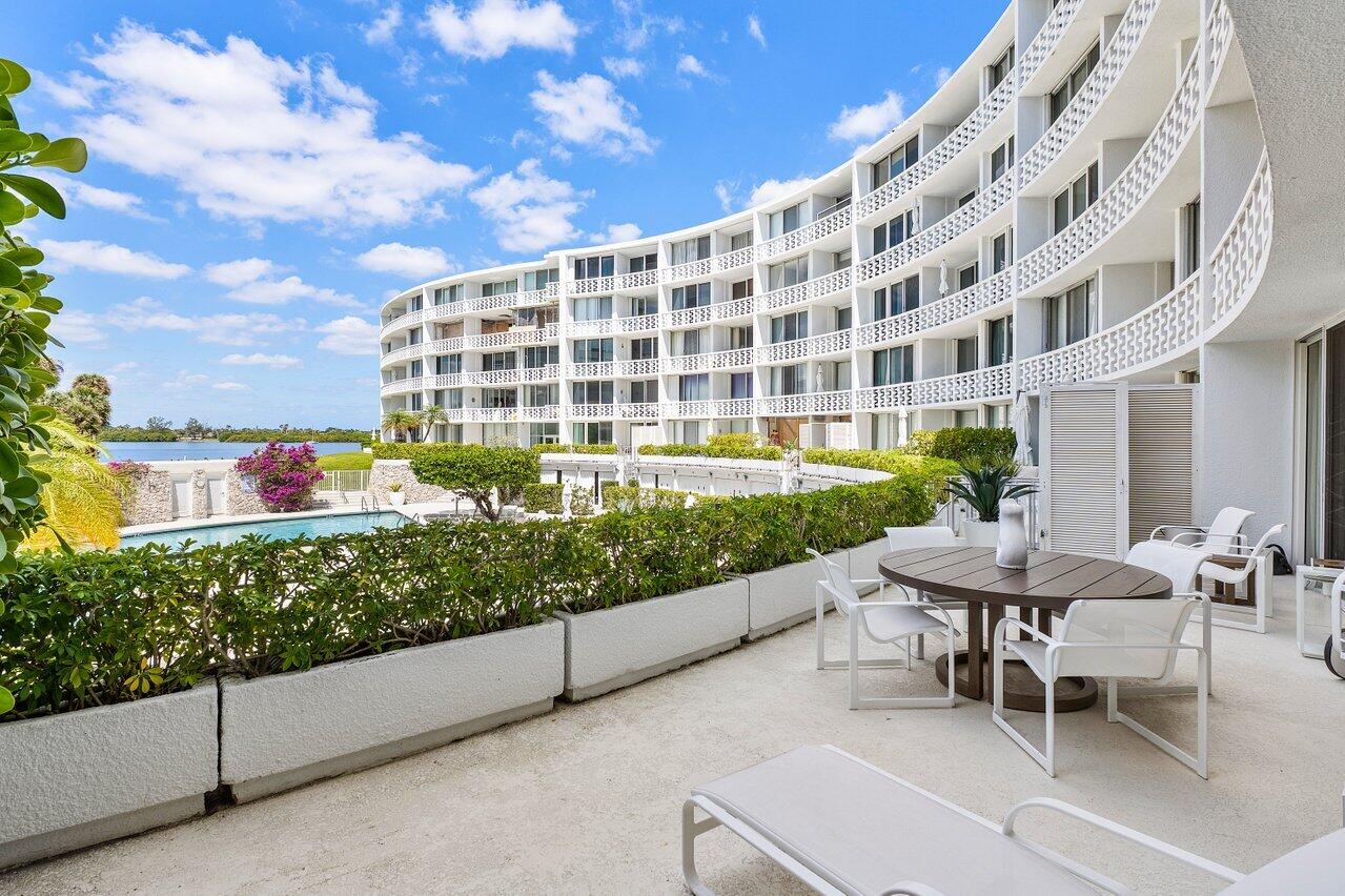 2760 South Ocean Boulevard, Unit 116 Palm Beach, FL 33480 - Photo 14 of 61 Patio Overlooking Pool