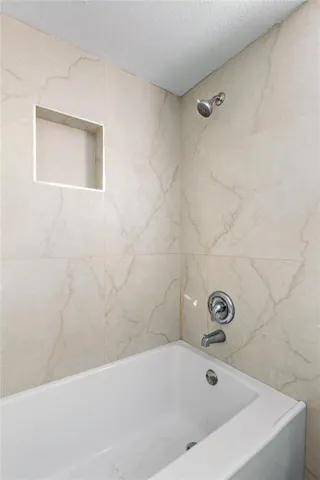 a bathroom with a bathtub