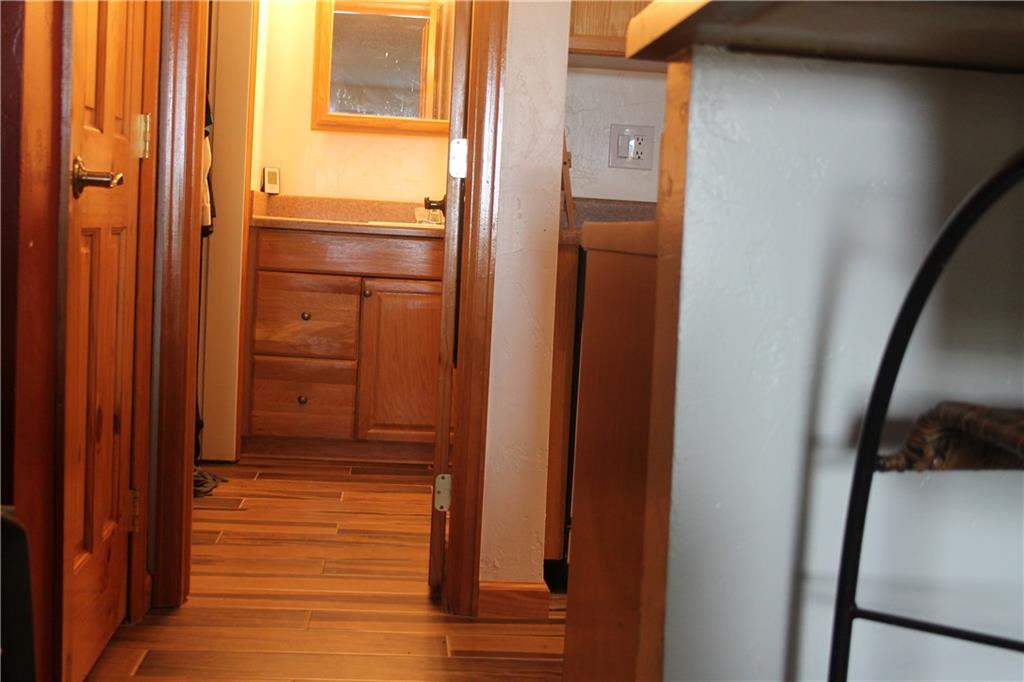 7204 Ryan Gulch Road, Unit 7204 Silverthorne, CO 80498 - Photo 14 of 17 a view of a bathroom with a door